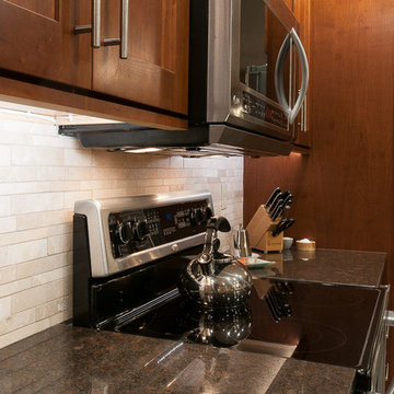 Eden Cherry Fox Kitchen with Two Islands and Granite Tops