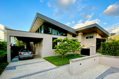 Inspiration for a mid-century modern garage remodel in Other