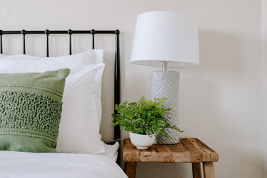 Example of a beach style bedroom design in San Diego