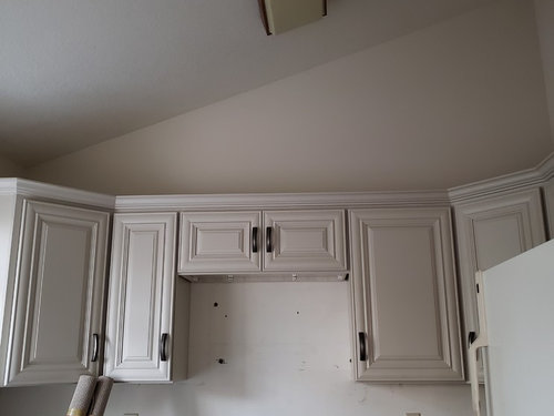 Lighting for kitchen with vaulted ceiling.