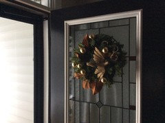 How do you hang a wreath when you have a storm door?