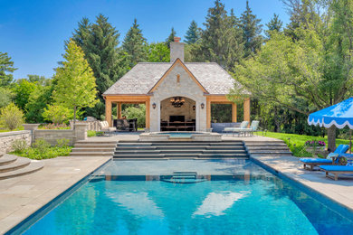 French country pool photo in Chicago