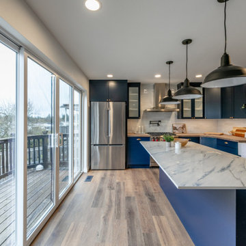 Open-Concept Great Room with Navy Kitchen and Seamless Social Flow