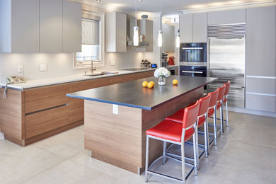 Handleless kitchen cabinets in a minimalist kitchen in Toronto