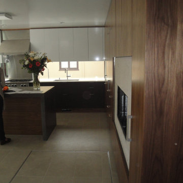 Kitchen secret floor hatch to wine cellar staircase