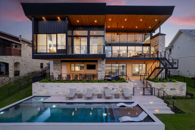 Inspiration for a huge contemporary exterior home remodel in Austin