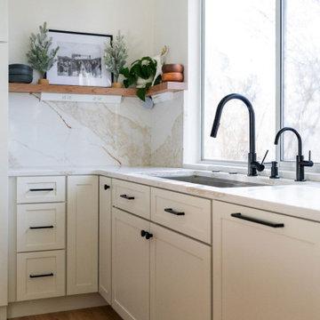 Kitchen Sink Area Remodeled with Quartz Backsplash in Broomfield, Colorado