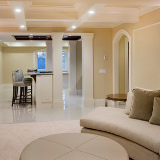 Inspiration for a large classic walk-out basement in Calgary with beige walls, marble flooring and no fireplace.