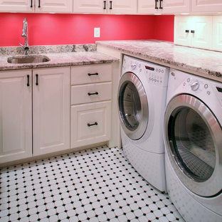 Inspiration for a medium sized classic u-shaped utility room in Raleigh with a submerged sink, recessed-panel cabinets, white cabinets, granite worktops, red walls, ceramic flooring and a side by side washer and dryer.