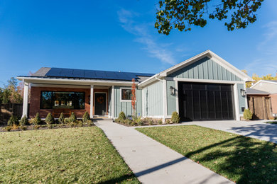 Example of a transitional one-story house exterior design in Salt Lake City