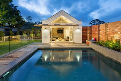Design ideas for a mid-sized beach style pool in Melbourne.