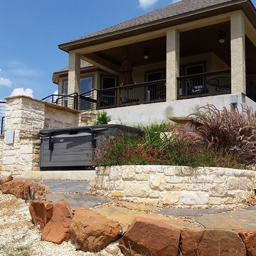 Multi-Level Patio with Hot Tub Water Feature and Boulder Staircase