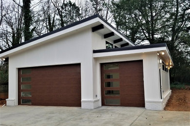Photo of a large midcentury garage in Charlotte.
