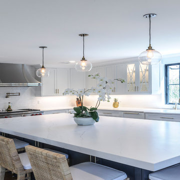 White Modern Kitchen with Compac Quartz Counters and Island