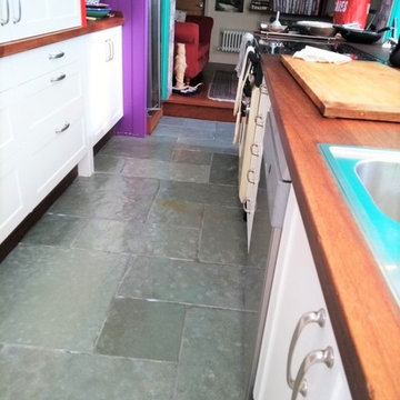 Raspberry Stained Flagstone Floor Cleaned and Sealed in Dursley