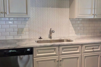 Kitchen - cottage kitchen idea in Other