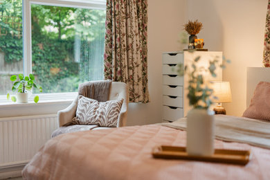 Photo of a modern bedroom in Surrey.