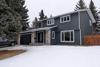 Transitional exterior home photo in Calgary