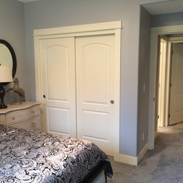 Urbandale basement with built in cabinets.