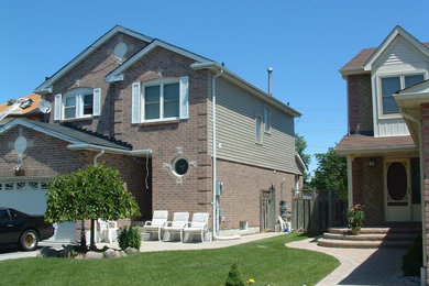 Example of a classic exterior home design in Toronto