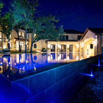 Southlake Reflective Vanishing Edge Pool with Perimeter Overflow Spa