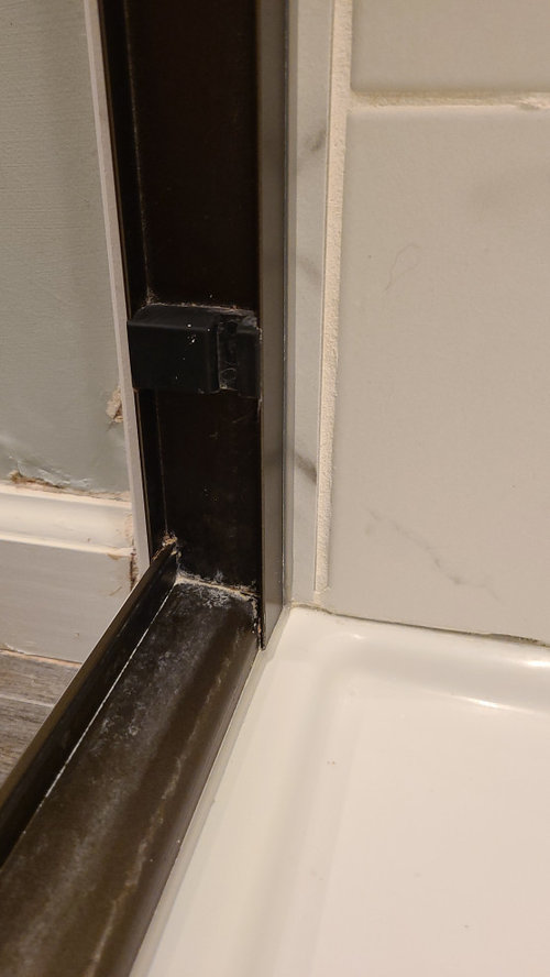Help! Tile shower leaking onto adjacent walls