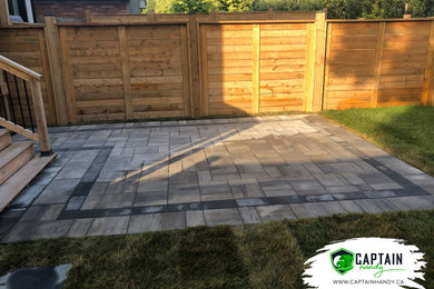 Patio - modern patio idea in Toronto