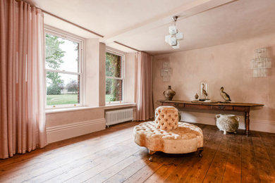 This is an example of an expansive victorian living room in Hampshire.