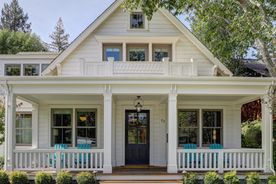 Mid-sized farmhouse white two-story wood and clapboard exterior home photo in San Francisco with a shingle roof and a gray roof