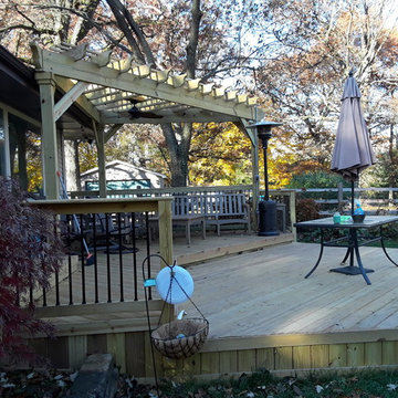 Multi-level Wood Deck with Pergola by Deck and Pergola Builder.