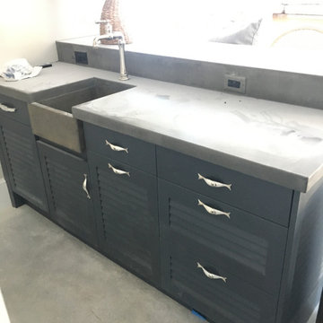 A fully equipped laundry room with a built ins