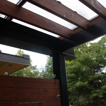 Custom Cedar Privacy Wall with Custom Steel Pergola