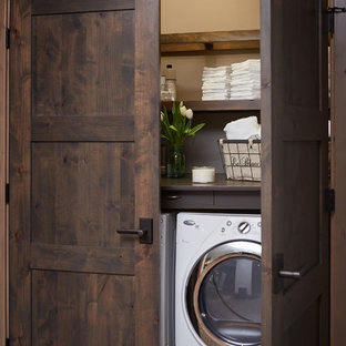 Photo of a rustic laundry cupboard in Grand Rapids.