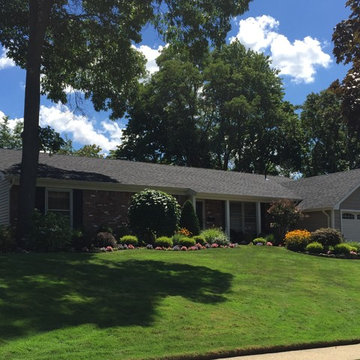 Farmingdale Siding - Tuscan Clay Shakes with Black Roof