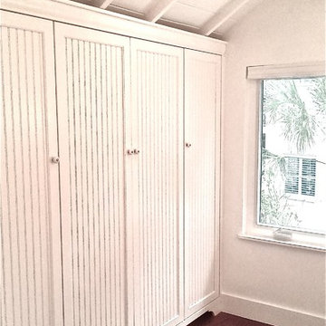 Beadboard Inset Closet Doors in Master Bath