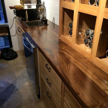Claro Countertops and Oak Cabinetry Finished in Resin and Urethane