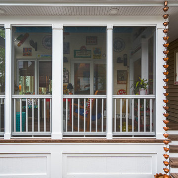 Midwest Screened Porch Addition with Eclectic Vintage Cottage Style