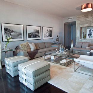 Example of a large trendy black floor living room design in Miami with gray walls