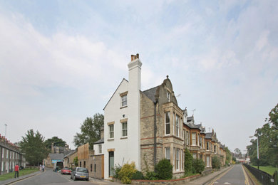 Inspiration for a medium sized contemporary brick semi-detached house in Devon with three floors.