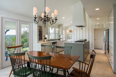 Example of a huge transitional porcelain tile kitchen/dining room combo design in Austin with white walls