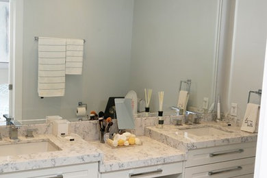 Inspiration for a mid-sized transitional master ceramic tile and beige floor bathroom remodel in Toronto with recessed-panel cabinets, white cabinets, gray walls, an undermount sink and marble countertops