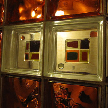 Close up of glass tiles fused onto glass blocks