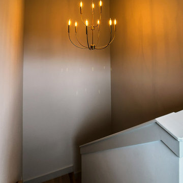 Elegant Staircase with Modern Chandelier Lighting