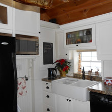 Black Appliances with Antique White Kitchen Cabinets