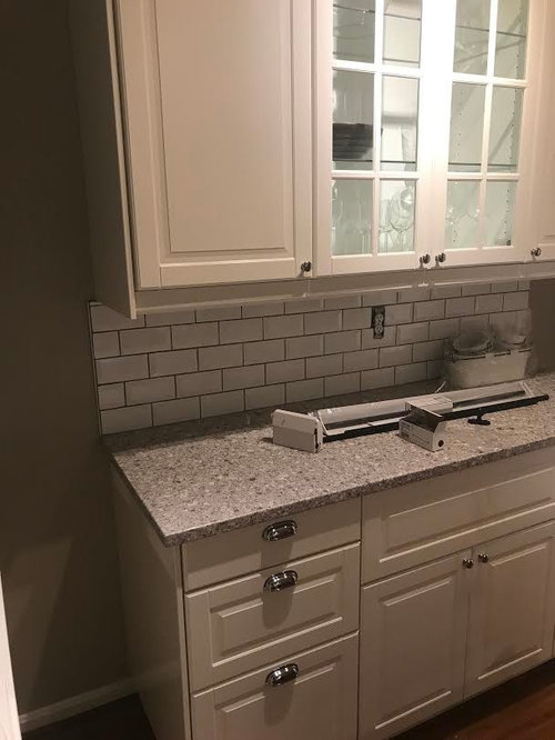 Are we being overly picky or is this a bad bevel Tile backsplash job?