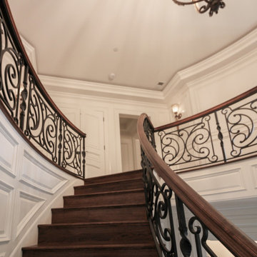 Project #74 | Circular Staircase with Hand-Forged Metal Panels