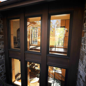 Transparent connecter hallways with open views to woods