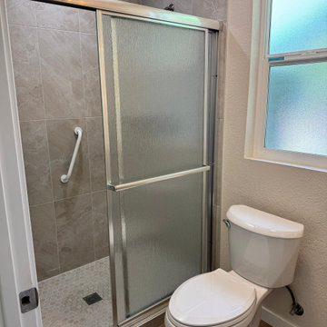 Bright Primary Suite with Wood-Look Flooring