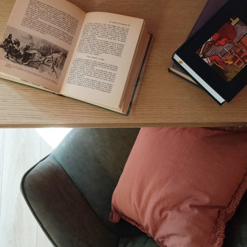 Un espace bibliothèque & détente dans un sous-sol