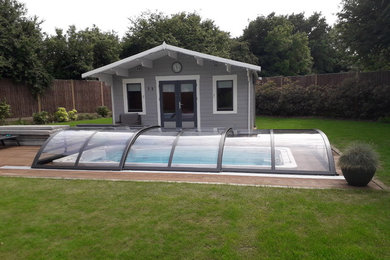 Installation of AZURE Flat Compact -  low level swimming pool enclosure